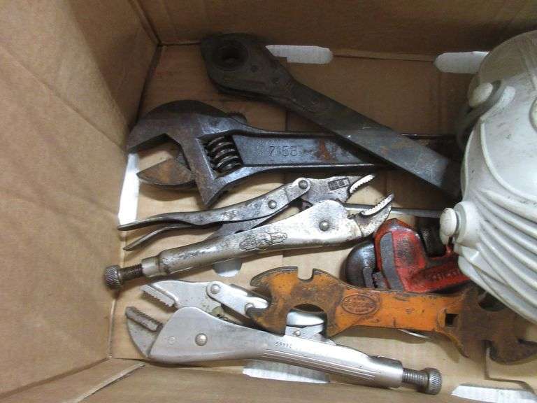 Set of knee pads, large Ridgid crescent wrench, large channel locks, (2