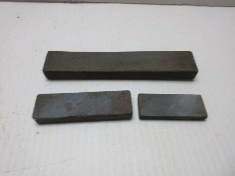 (4) Older hunting knives, one sheath, sharpening rods, and (3