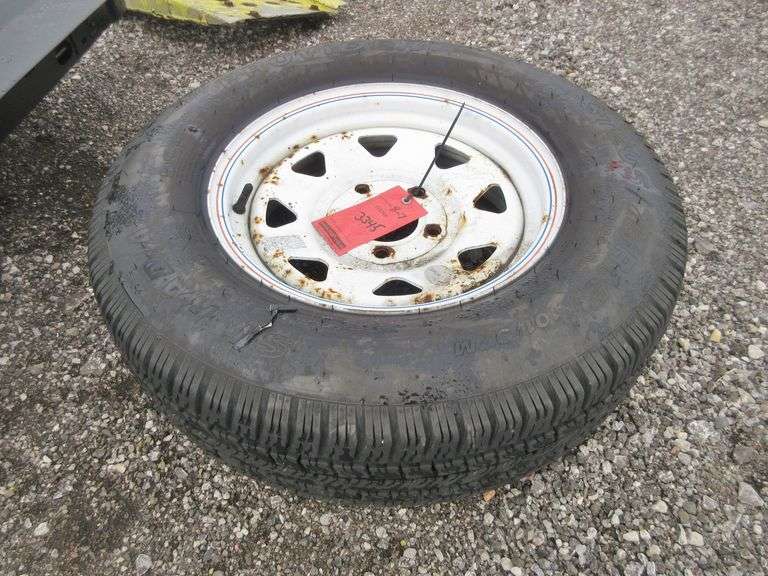 ST 205/75R15 trailer tire and rim, DOT TMXM JJ x 15 11 1503, 1820 lb