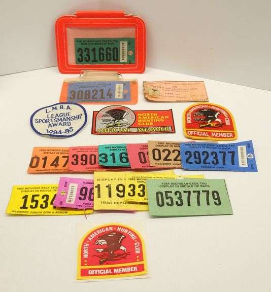 Various 1980s to 1990s Michigan bow/gun deer hunting licenses, back