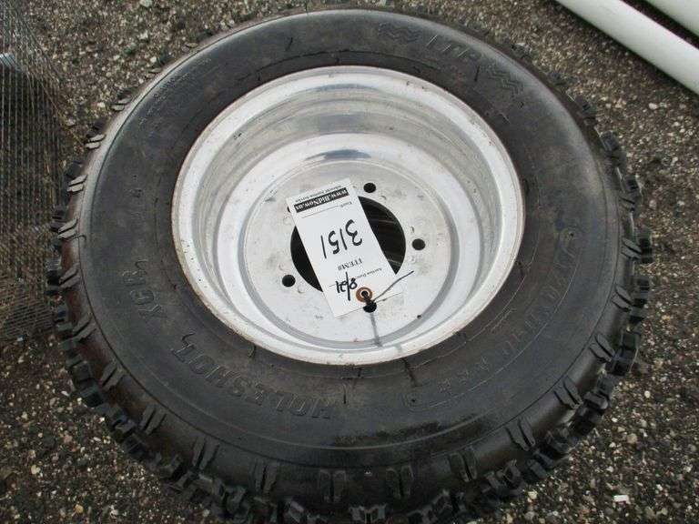 (4) ATV rims and tires, tire tread is like new, wheels good, and hold