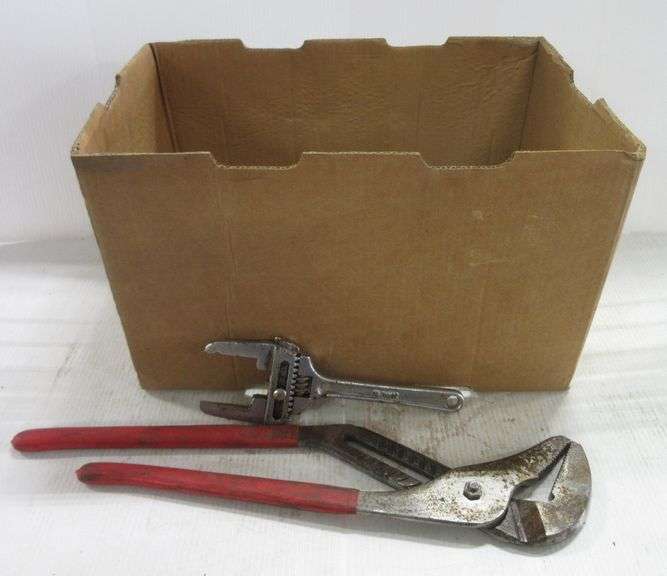 Set of knee pads, large Ridgid crescent wrench, large channel locks, (2