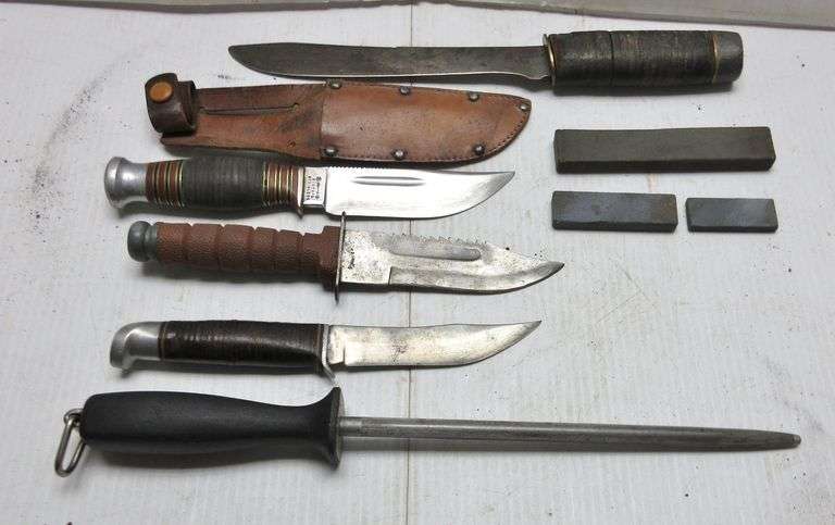 (4) Older hunting knives, one sheath, sharpening rods, and (3