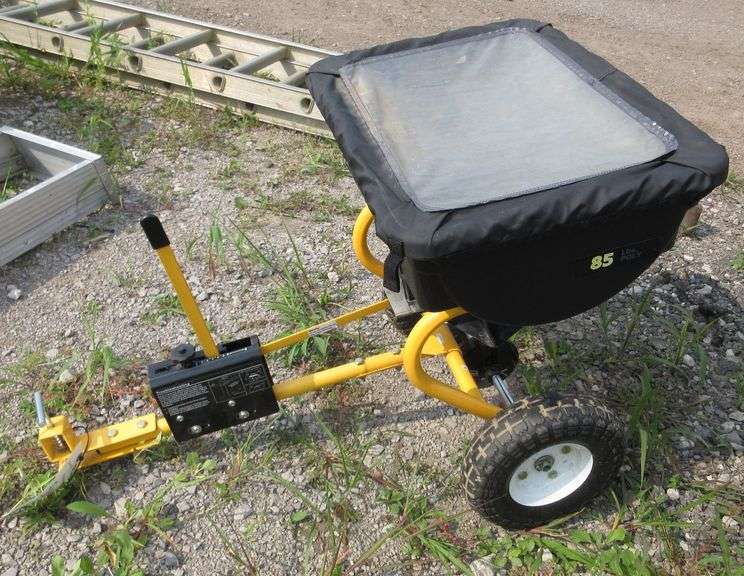 Yardworks pull behind spreader, like new, very little use Albrecht Auction Service