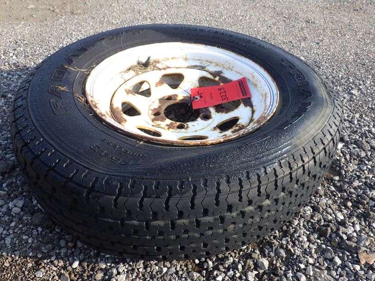 14" Trailer tire, used, flat Albrecht Auction Service