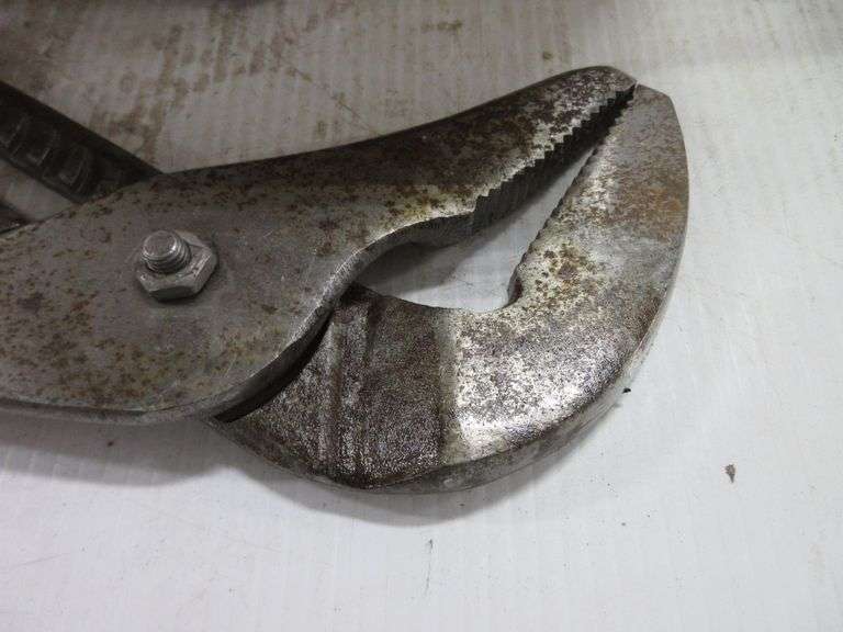 Set of knee pads, large Ridgid crescent wrench, large channel locks, (2