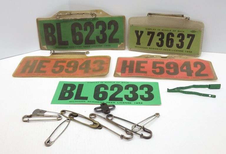 (5) Vintage 1950s Michigan deer hunting licenses, 4 with plastic