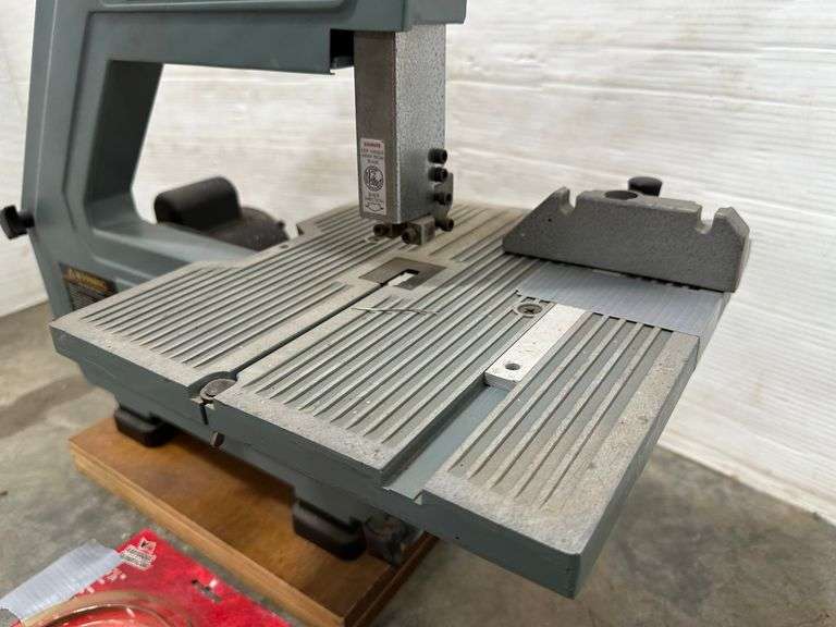 Delta bandsaw, Catalog No. 28160, Serial No. 9139, mounted on plywood