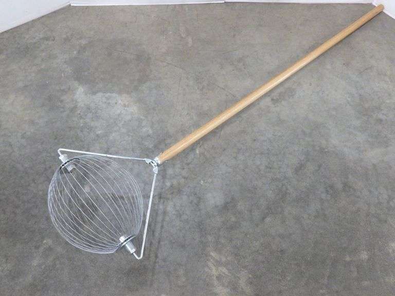 Rolling nut gatherer, picks up nuts and small fruit, rolls well, very