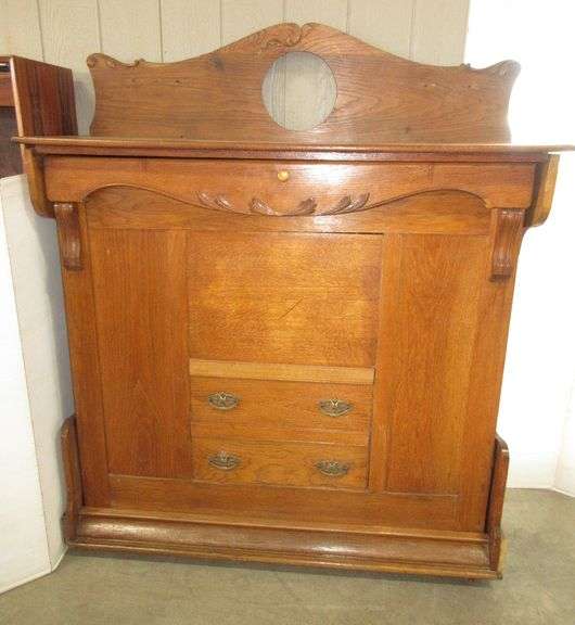 Antique oak murphy bed, springs intact, no mattress, upper decorative