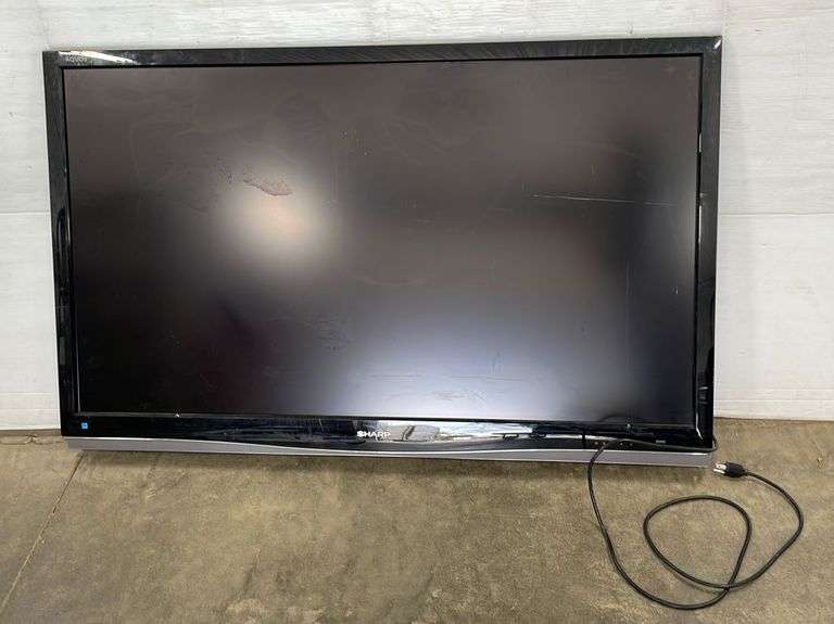 Sharp 50" Aquos TV, does not come with the remote, works great Albrecht Auction Service