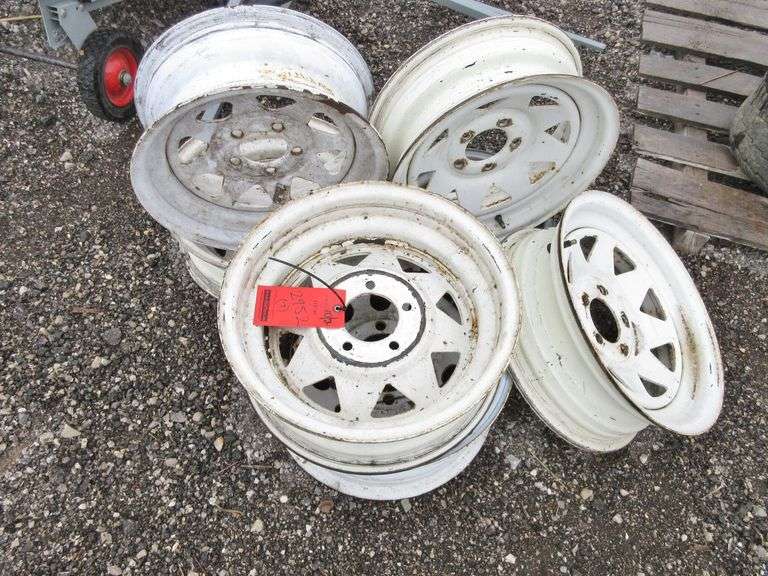 (7) Rims Six 15" trailer wheels, One 13" Trailer wheel, used