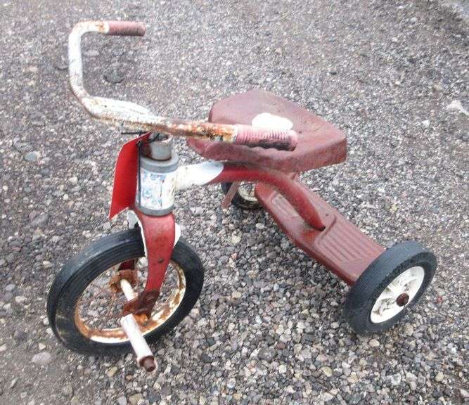 Old tricycle, rusty Albrecht Auction Service
