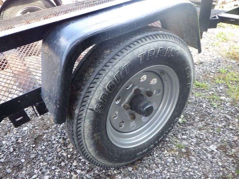 Small utility trailer, 1 7/8" ball, tilt bed 49" x 72", has new tires