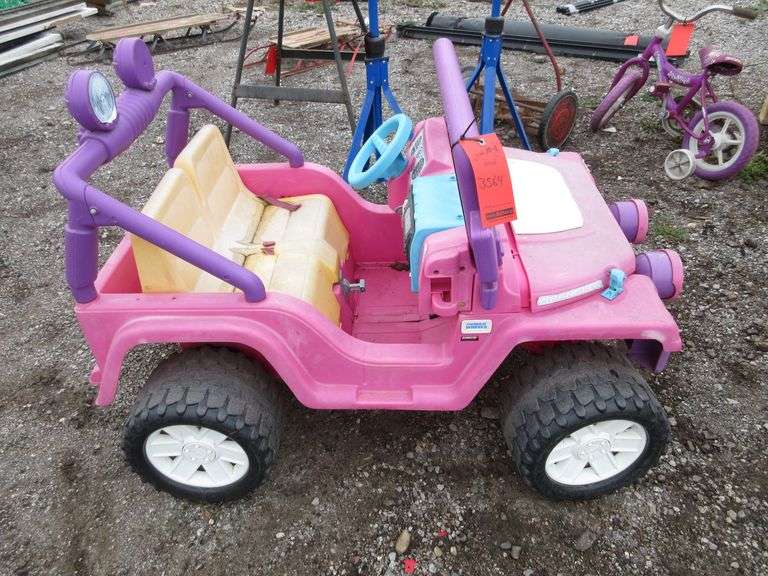 Barbie jeep, has two forward speeds, two reverse speeds, faded, good