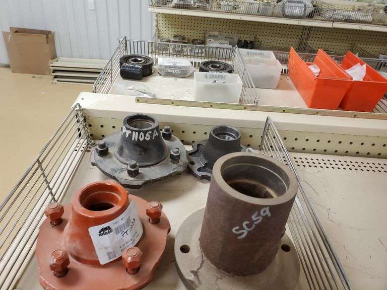 (3) 5 Bolt Hubs and (1) 4 Bolt Hub Assiter Auctioneers