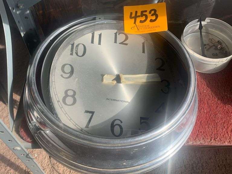 International 12" Wall Clock, Needs Repair Assiter Auctioneers