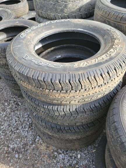 4 Goodyear Wrangler P235/70R16 Tires - Baer Auctioneers - Realty, LLC