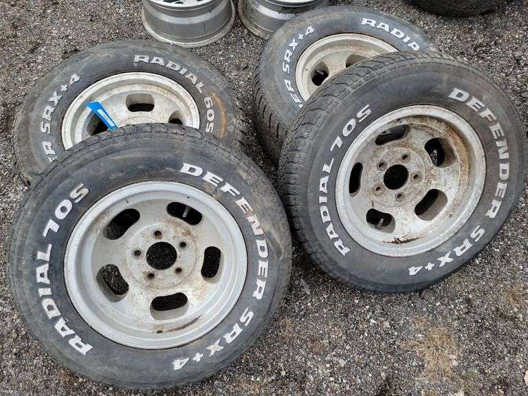 4 5 Bolt Alum. Rims and Tires Baer Auctioneers Realty, LLC