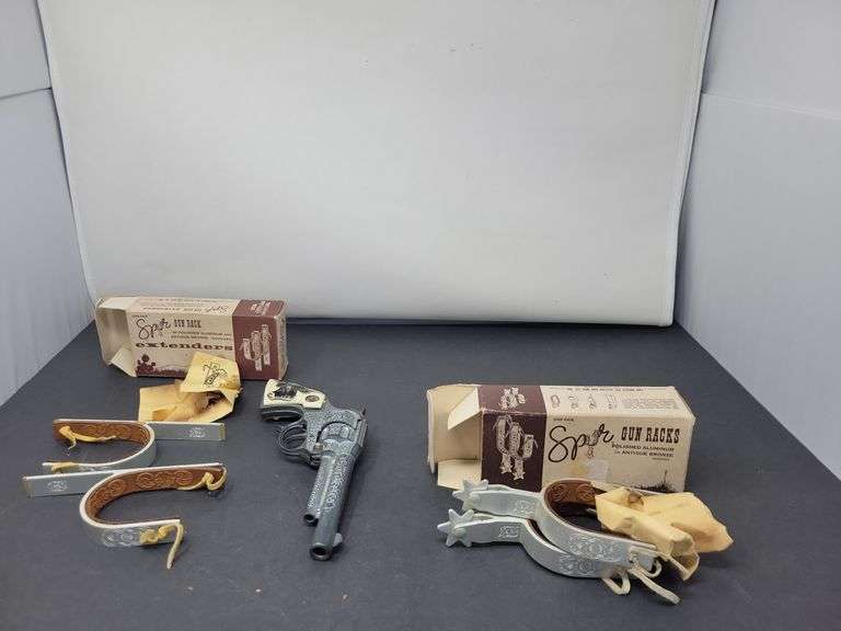 Texan Jr. Cap Gun, Spurs, And Gun Rack Baer Auctioneers Realty, LLC