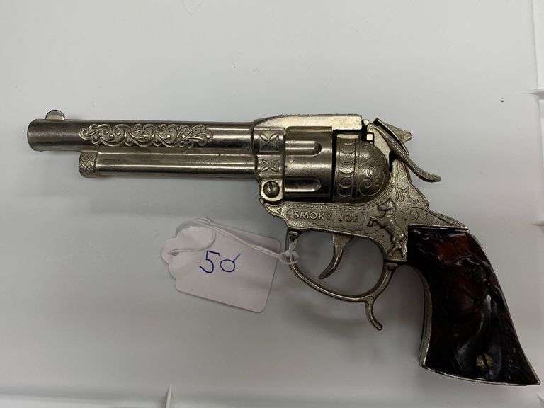 LeslieHenry "Smoky Joe" Cast Aluminum Cap Gun Baer Auctioneers