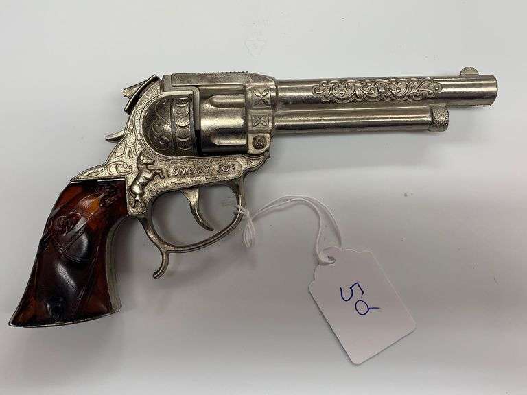 LeslieHenry "Smoky Joe" Cast Aluminum Cap Gun Baer Auctioneers