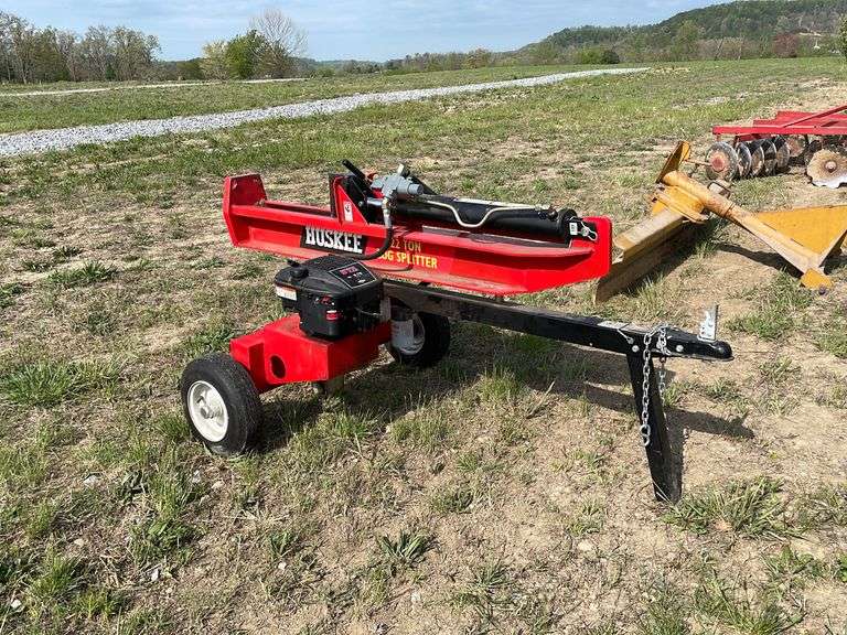 Huskee 22 ton log splitter Baker Auctions & Real Estate, LLC