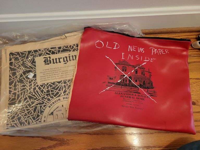 Old newspapers Baker Auctions & Real Estate, LLC