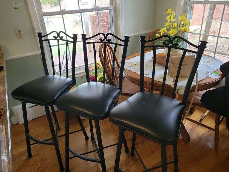 3 Black swivel bar stools Baker Auctions & Real Estate, LLC