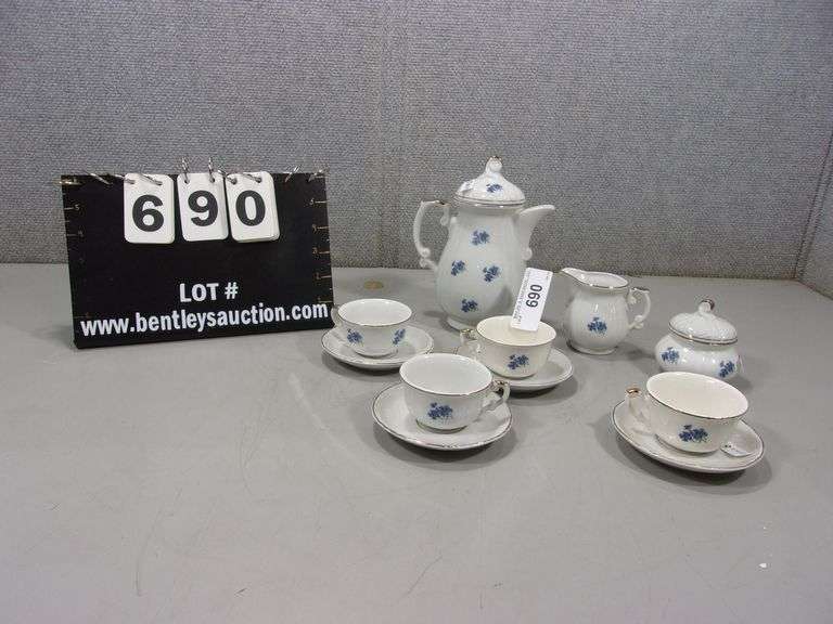 LOT (11) WHITE W/ BLUE FLOWERS TEA SET 4SAUCERS, 4TEACUPS, 1CREAM, 1SUGAR, 1TEAPOT