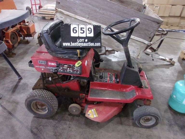 TORO WHEEL HORSE 825 RIDING LAWN MOWER Bentley & Associates, LLC