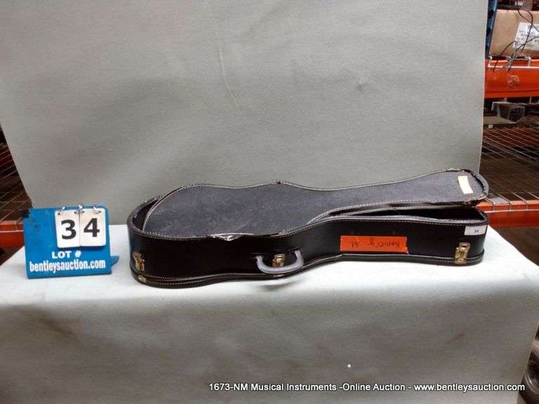 EMPTY GUITAR CASE Bentley & Associates, LLC