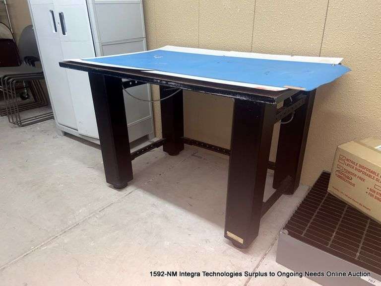 TMC OPTICAL TABLE Bentley & Associates, LLC