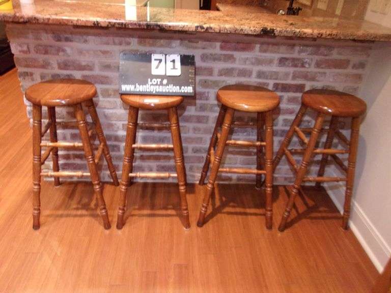 STAINED OAK SPINDLE BAR STOOLS (4X MONEY) Bentley & Associates, LLC