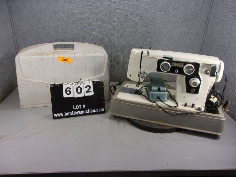 VINTAGE WHITE ELECTRIC SEWING MACHINE IN WHITE CASE Bentley & Associates, LLC
