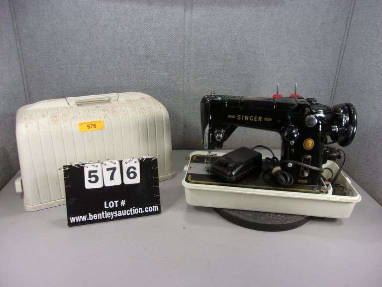 VINTAGE SINGER SEWING MACHINE BLACK & GOLD ELECTRIC IN CASE Bentley & Associates, LLC