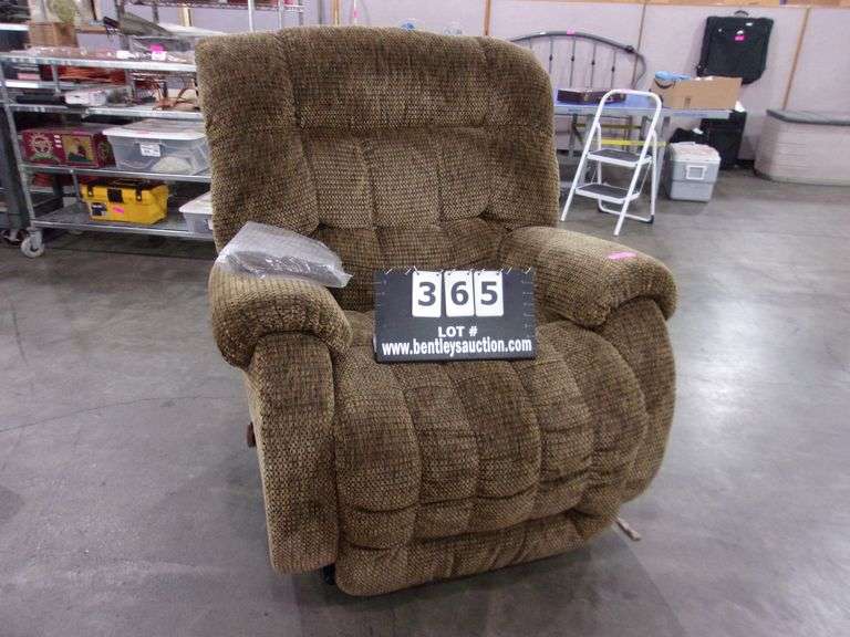 LARGE BROWN UPHOLSTERED OVERSIZED RECLINER Bentley & Associates, LLC