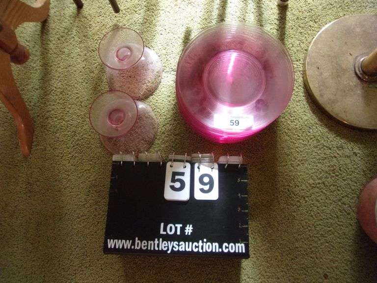 LOT (12) PINK PLATES, (2) CANDLE HOLDERS Bentley & Associates, LLC