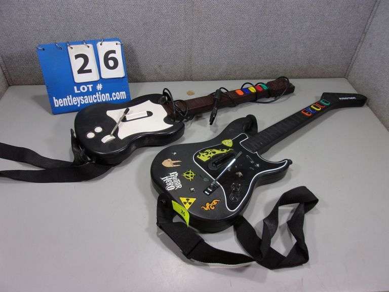 LOT (2) GUITAR HERO GUITARS Bentley & Associates, LLC