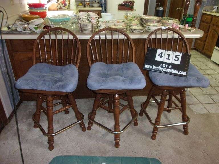 DARK WALNUT SPINDLE BACK SWIVEL BAR STOOLS Bentley & Associates, LLC