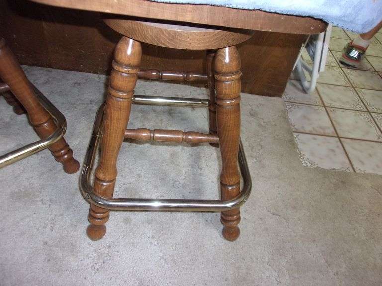 DARK WALNUT SPINDLE BACK SWIVEL BAR STOOLS Bentley & Associates, LLC