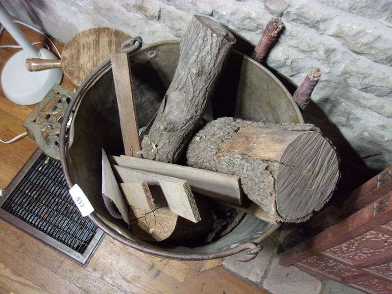 BRASS METAL BUCKET OF FIREWOOD Bentley & Associates, LLC