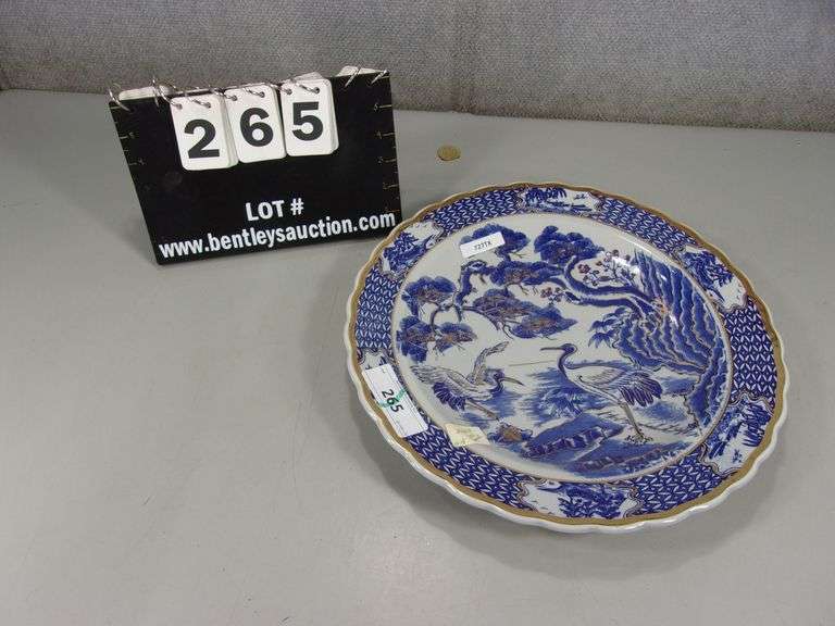 CERAMIC, BLUE & GOLD TRIMMED DECORATIVE PLATE W/ CRANE IN FOREST DESIGN