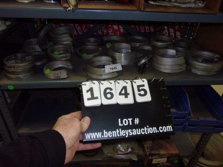 ASSORTED SIZES OF COIL SPRING SHIMS Bentley & Associates, LLC