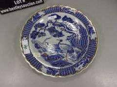 CERAMIC, BLUE & GOLD TRIMMED DECORATIVE PLATE W/ CRANE IN FOREST DESIGN