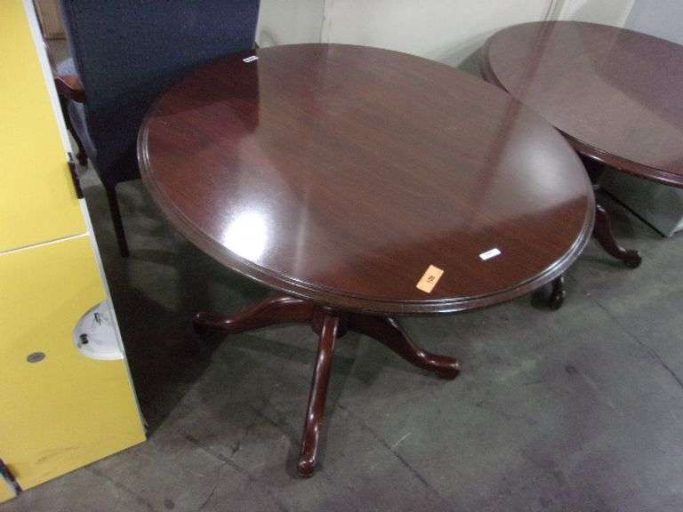 ROUND WOODEN TABLE Bentley & Associates, LLC