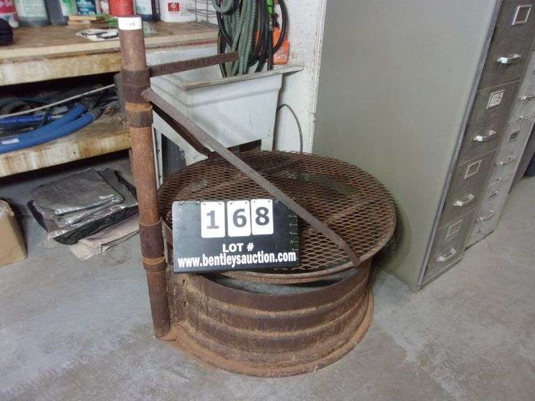 RUSTED IRON FIRE PIT Bentley & Associates, LLC