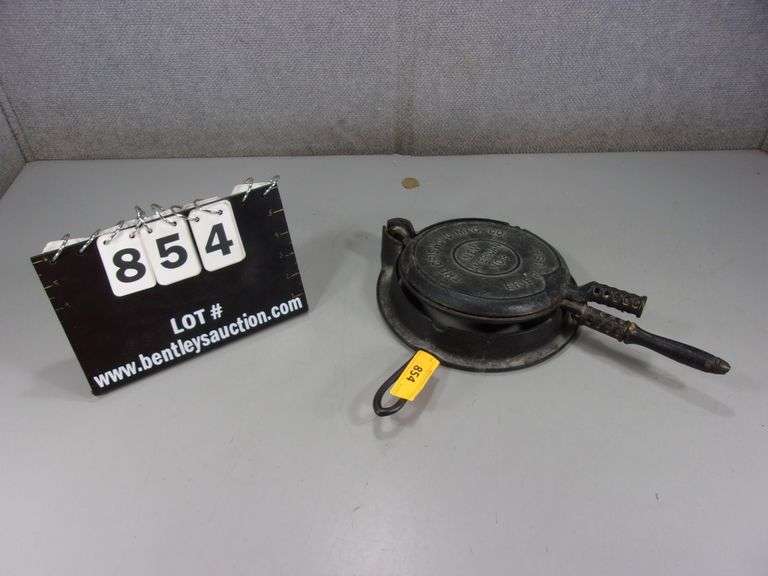 CAST IRON WAFFLE MAKER Bentley & Associates, LLC