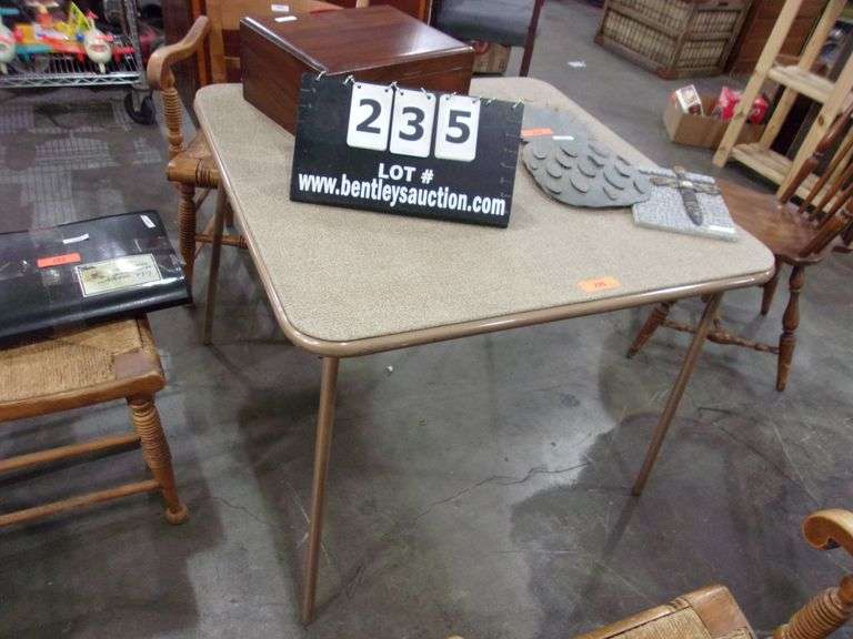 BROWN VINYL TOP FOLDING CARD TABLE Bentley & Associates, LLC