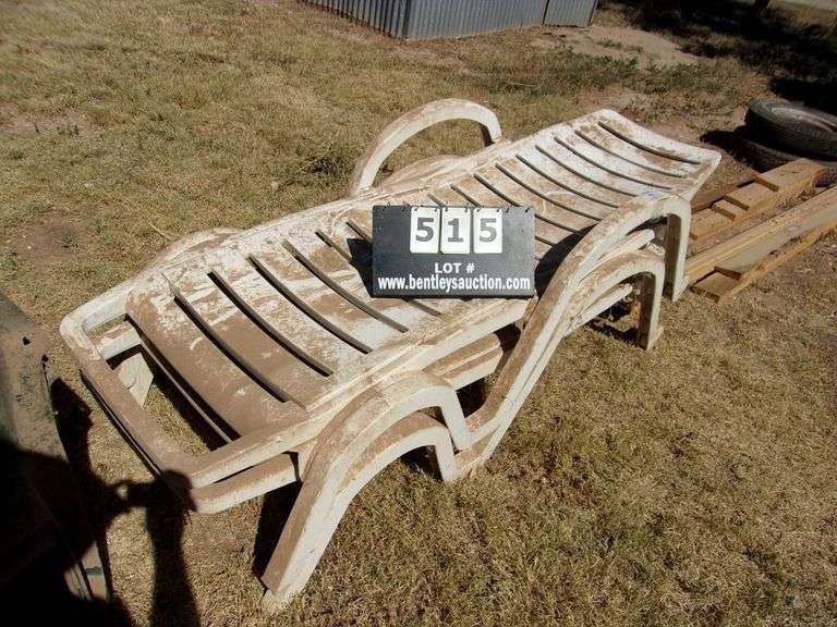 2 WHITE PLASTIC PATIO LOUNGE CHAIRS Bentley & Associates, LLC